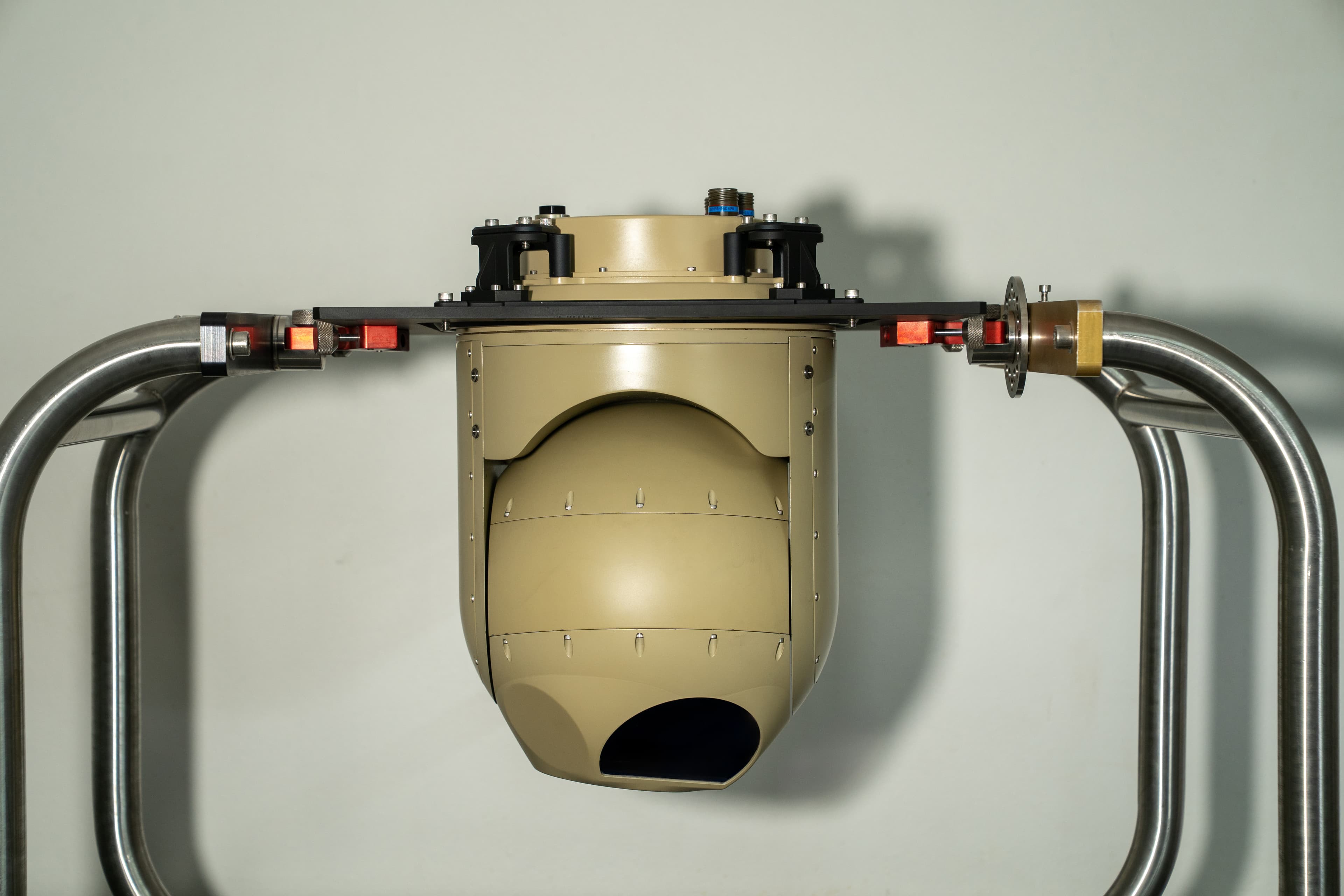 SPA280 surveillance gimbal, front view showing sensor apertures